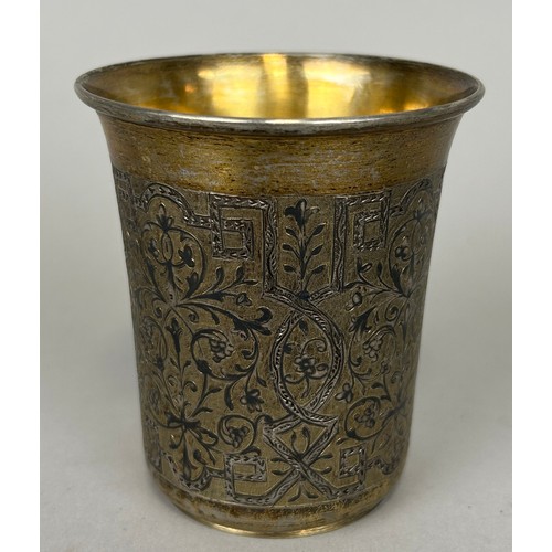 135 - A RUSSIAN NIELO SILVER BEAKER WITH SILVER GILT INTERIOR,

Marked 84 to verso. 

Weight: 112gms 

8cm... 