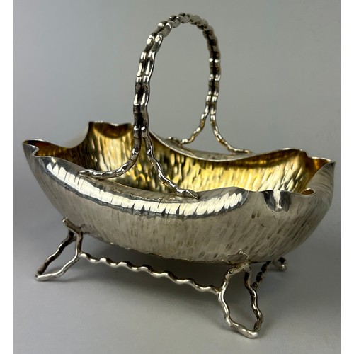 118 - ATTRIBUTED TO CHRISTOPHER DRESSER FOR HUKIN AND HEATH: A SILVER PLATED BASKET, 

15cm x 14cm x 10cm