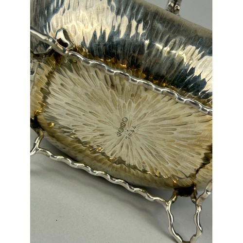 118 - ATTRIBUTED TO CHRISTOPHER DRESSER FOR HUKIN AND HEATH: A SILVER PLATED BASKET, 

15cm x 14cm x 10cm