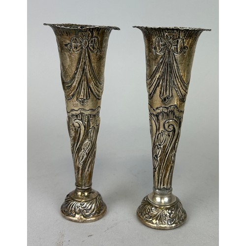 136 - A PAIR OF SILVER POSY VASES, 

Marked for London, 'WC JL',

14cm H 

Weighted. 

Total weight: 325gm... 