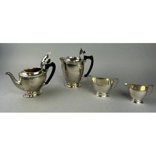 140 - A SILVER TEA SERVICE BY JAMES DEAKIN AND SONS COMPRISING OF A TEA POT, HOT WATER POT, SUGAR BOWL AND... 