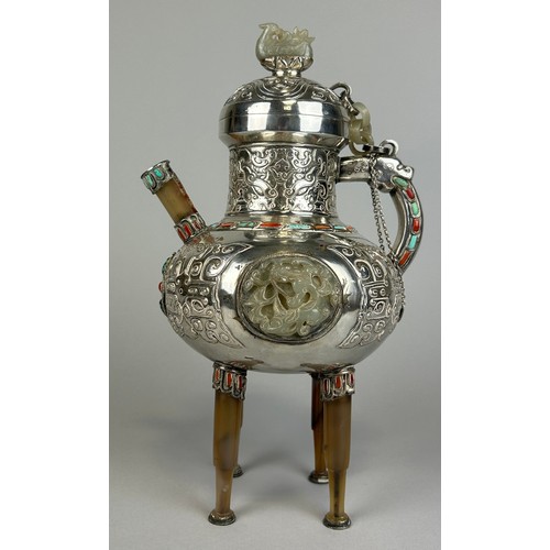 160 - AN EARLY 20TH CENTURY CHINESE WHITE METAL POT IN THE MONGOLIAN STYLE WITH HARDSTONES, JADE PLAQUE AN... 