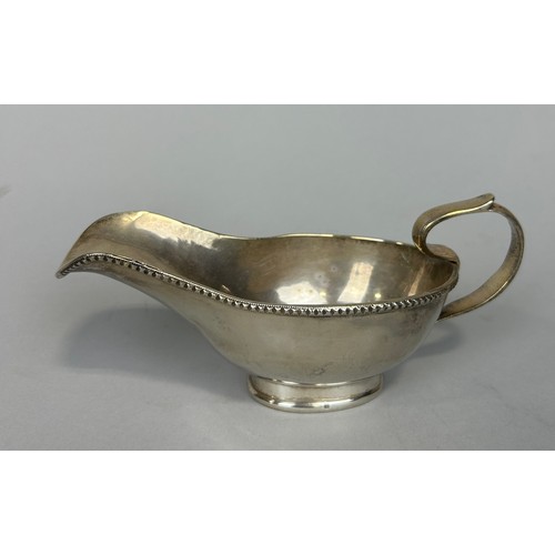 148 - A SILVER GRAVY BOAT,

Weight: 242gms