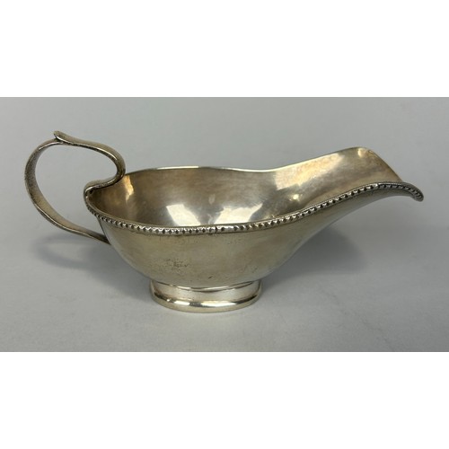 148 - A SILVER GRAVY BOAT,

Weight: 242gms