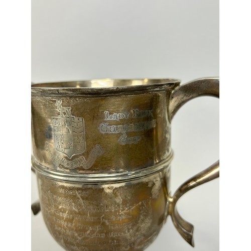 154 - 'THE LADY BUSK CHALLENGE CUP': A SILVER TROPHY CUP FROM UNIVERSITY OF LONDON, 

Inscribed with stude... 