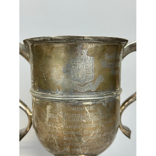 154 - 'THE LADY BUSK CHALLENGE CUP': A SILVER TROPHY CUP FROM UNIVERSITY OF LONDON, 

Inscribed with stude... 