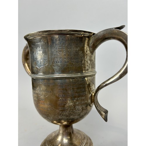 154 - 'THE LADY BUSK CHALLENGE CUP': A SILVER TROPHY CUP FROM UNIVERSITY OF LONDON, 

Inscribed with stude... 