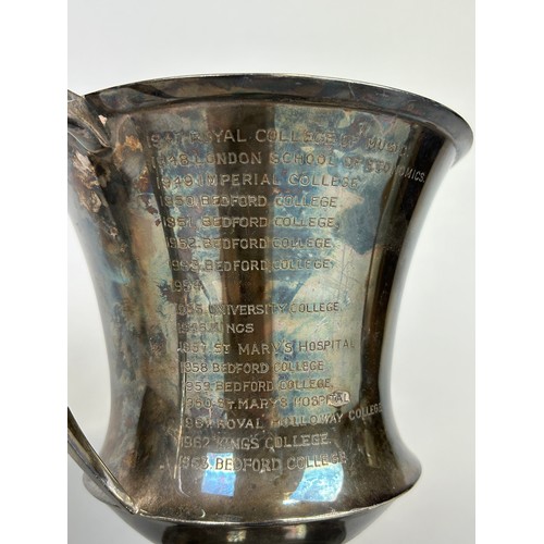 155 - SPORTING INTEREST: AN ARTS AND CRAFTS SILVER TROPHY FOR THE UNIVERSITY OF LONDON INTER COLLEGIATE LA... 