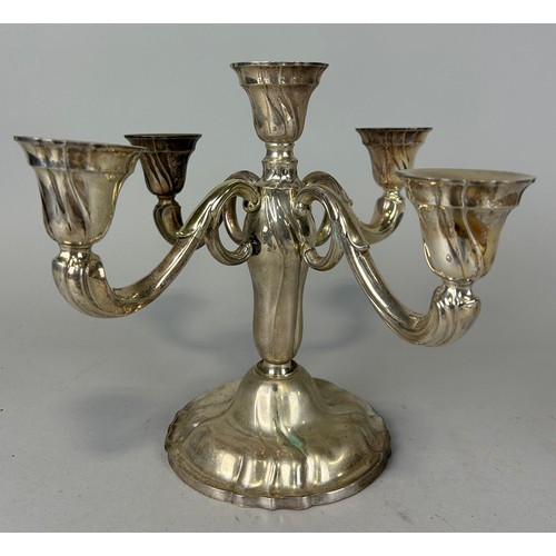 146 - A SILVER FOUR ARM CANDELABRA, 

Marked 830. 

Weighted. 

Weight 1102gms