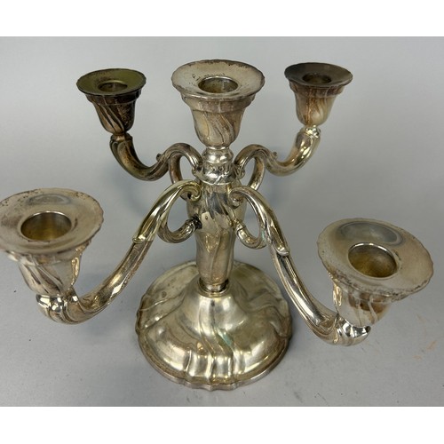 146 - A SILVER FOUR ARM CANDELABRA, 

Marked 830. 

Weighted. 

Weight 1102gms