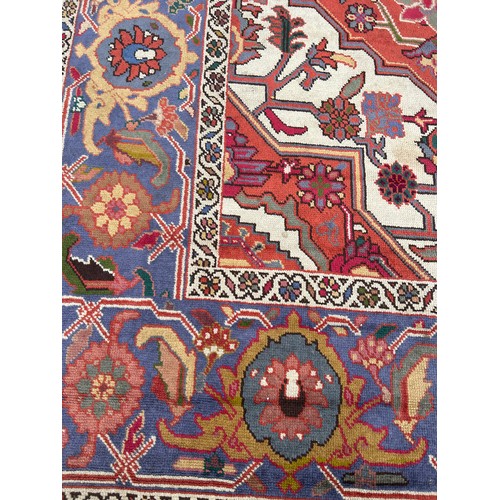 849 - A LARGE PERSIAN DESIGN CARPET,

400cm x 315cm