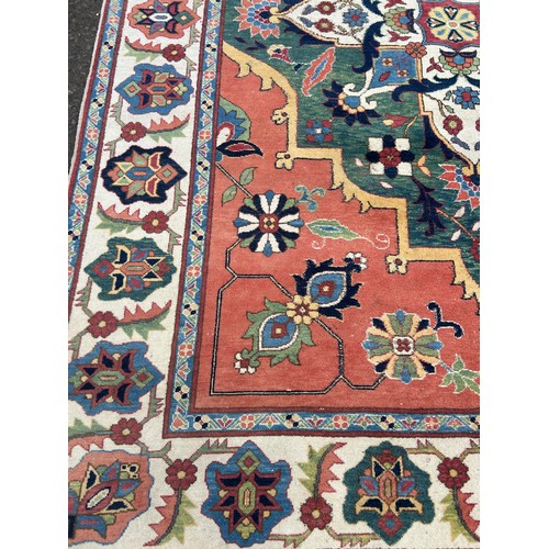 850 - A PERSIAN DESIGN CARPET,

300cm x 220cm