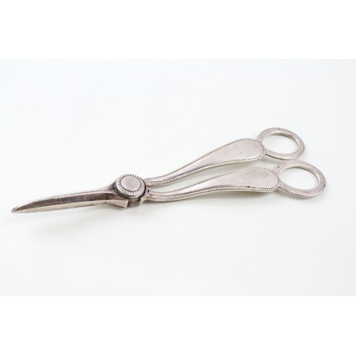 173 - A 925 STERLING SILVER PAIR OF VICTORIAN GRAPE SCISSORS,

Weight: 100gms