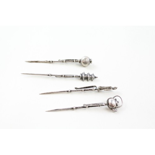 165 - FOUR 925 STERLING SILVER CHINESE TOOTHPICKS,

Weight: 11gms