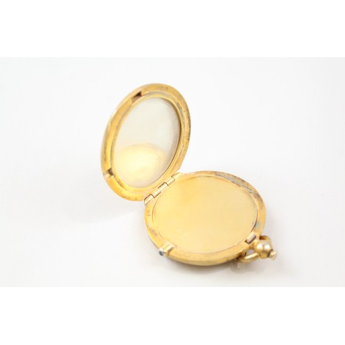 171 - A 925 STERLING SILVER AND GILT LADIES VANITY COMPACT,

Weight: 57gms