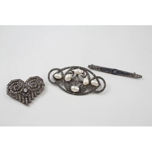 191 - THREE SILVER ART DECO PASTE BROOCHES,

Weight: 40gms