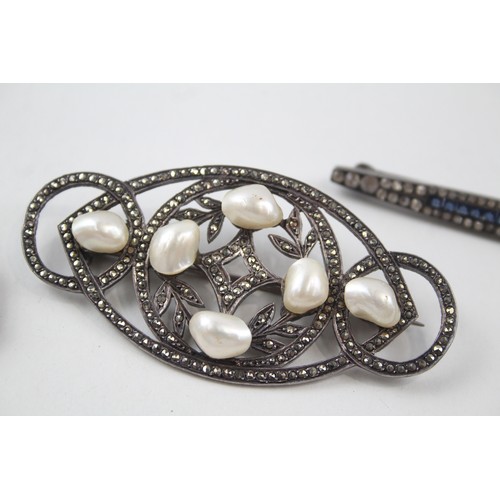 191 - THREE SILVER ART DECO PASTE BROOCHES,

Weight: 40gms