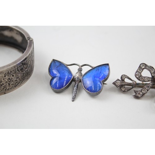 198 - A COLLECTION OF SILVER TINAGE JEWELLERY INCLUDING BUTTERFLY WING,

Weight: 34gms