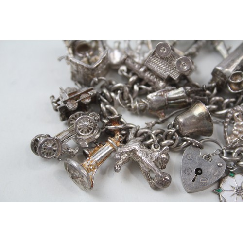 181 - SILVER CHARM BRACELET WITH TRANSPORT CHARMS,

Weight: 101gms