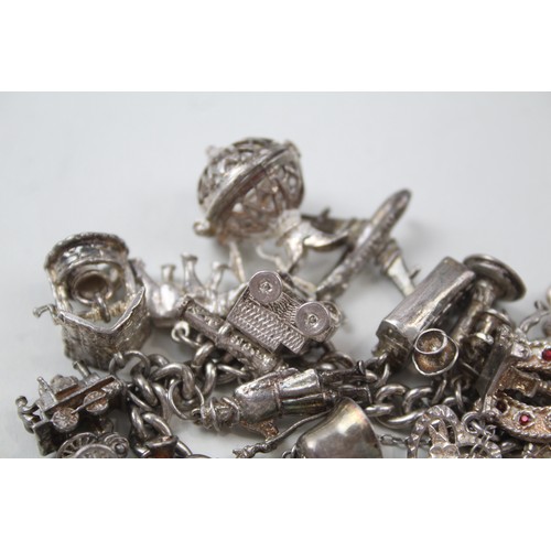 181 - SILVER CHARM BRACELET WITH TRANSPORT CHARMS,

Weight: 101gms