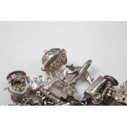 181 - SILVER CHARM BRACELET WITH TRANSPORT CHARMS,

Weight: 101gms