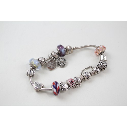 187 - SILVER PANDORA CHARM BRACELET AND CHARMS INCLUDING FAMILY,

Weight: 63gms