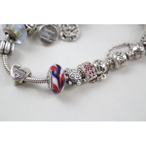 187 - SILVER PANDORA CHARM BRACELET AND CHARMS INCLUDING FAMILY,

Weight: 63gms