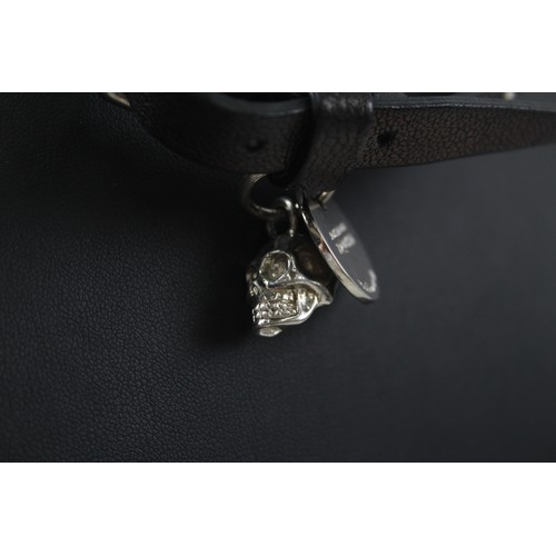 209 - A LEATHER CHOKER NECKLACE WITH SKULL PENDANT BY DESIGNER ALEXANDER MCQUEEN,

Weight: 25gms