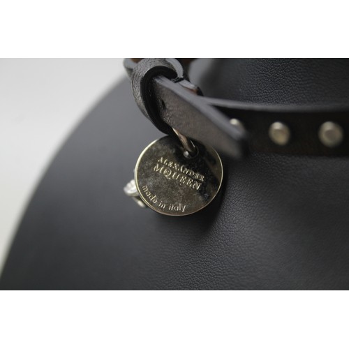 209 - A LEATHER CHOKER NECKLACE WITH SKULL PENDANT BY DESIGNER ALEXANDER MCQUEEN,

Weight: 25gms