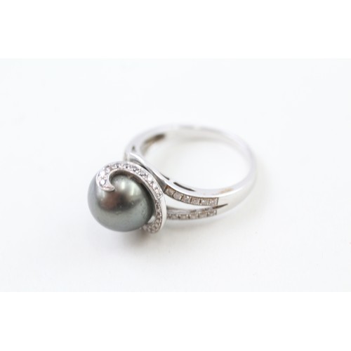 206 - AN 18CT WHITE GOLD, DIAMOND AND CULTURED PEARL COCKTAIL RING, 

Weight: 6.4gms