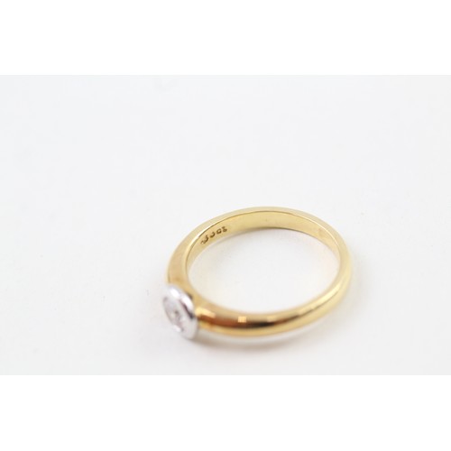 207 - AN 18CT GOLD WHITE AND YELLOW GOLD RUB OVER SET ROUND BRILLIANT DIAMOND SOLITAIRE RING, 

Weight: 4.... 