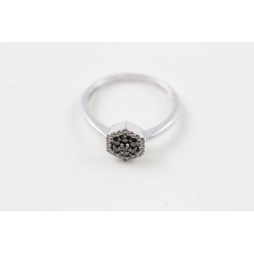 208 - AN 18CT WHITE GOLD DIAMOND AND BLACK GEMSTONE CLUSTER RING, 

Weight: 2.7gms