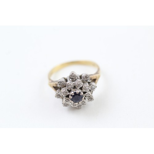 217 - AN 18CT WHITE AND YELLOW GOLD SAPPHIRE AND DIAMOND SET CLUSTER RING, 

Weight: 5.9gms