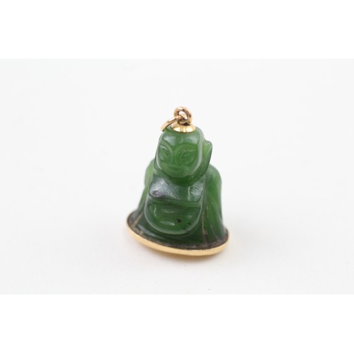 218 - AN 18CT GOLD MOUNTED CARVED GREEN NEPHRITE BUDDHA PENDANT, 

Weight: 6.1gms