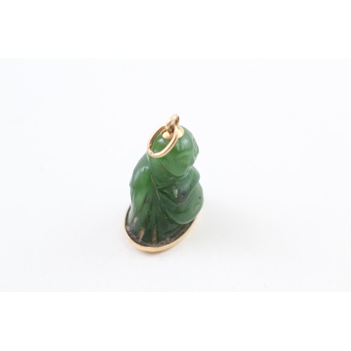 218 - AN 18CT GOLD MOUNTED CARVED GREEN NEPHRITE BUDDHA PENDANT, 

Weight: 6.1gms