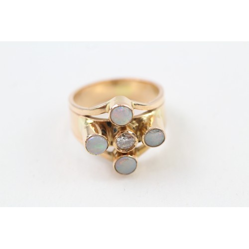 224 - AN 18CT GOLD OPAL AND DIAMOND SET CROSS CLUSTER RING, 

Weight: 8.1gms