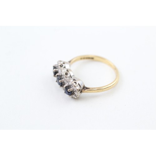 255 - AN 18CT GOLD, SAPPHIRE AND DIAMOND SET TRILOGY CLUSTER RING, 

Weight: 4.0gms