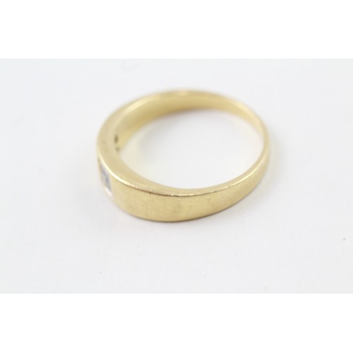 229 - AN 18CT GOLD ILLUSION DIAMOND SET BAND RING, 

Weight: 7.5gms