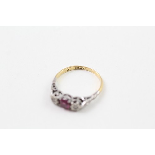 232 - AN 18CT GOLD, PLATINUM AND RUBY THREE STONE RING, 

Weight: 2.1gms