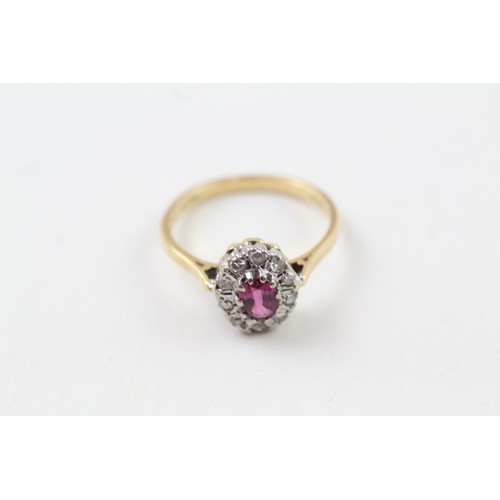 237 - AN 18CT GOLD, DIAMOND AND RUBY OVAL HALO RING, 

Weight: 3.2gms