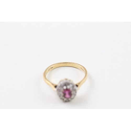 237 - AN 18CT GOLD, DIAMOND AND RUBY OVAL HALO RING, 

Weight: 3.2gms