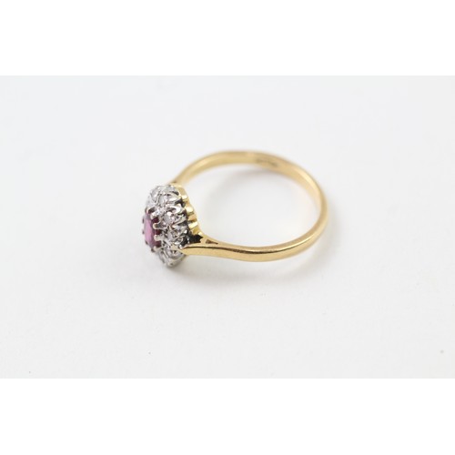 237 - AN 18CT GOLD, DIAMOND AND RUBY OVAL HALO RING, 

Weight: 3.2gms