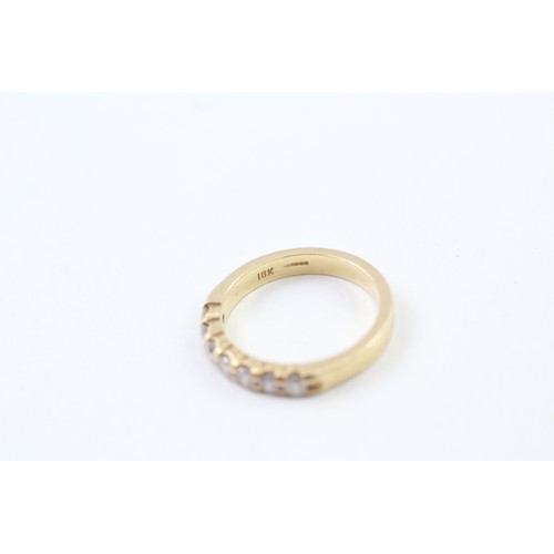 239 - AN 18CT GOLD ROUND BRILLIANT DIAMOND SET SEVEN STONE ETERNITY RING, 

Weight: 4.1gms