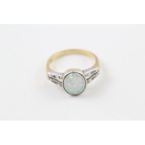 240 - AN 18CT GOLD OPAL SINGLE STONE RING WITH DIAMOND SET SHOULDERS, 

Weight: 4.3gms