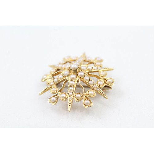 246 - AN 18CT GOLD ANTIQUE VICTORIAN SEED PEARL STARBURST BROOCH WITH BASE METAL PIN, 

Weight: 4.9gms