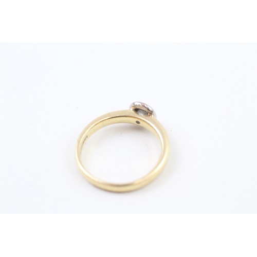 252 - AN 18CT GOLD, WHITE AND YELLOW GOLD RUB OVER SET DIAMOND SOLITAIRE RING, 

Weight: 4.2gms