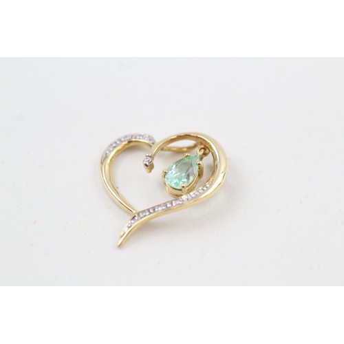 264 - AN 18CT GOLD, DIAMOND AND TOURMALINE HEART PENDANT, 

Weight: 2.1gms