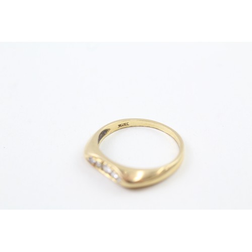 267 - AN 18CT GOLD, DIAMOND SET CONCAVE FIVE STONE ETERNITY RING, 

Weight: 3.0gms