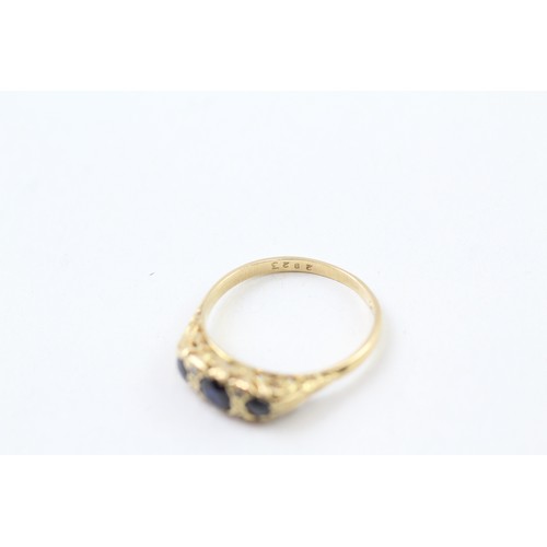 282 - AN 18CT GOLD, DIAMOND AND SAPPHIRE SEVEN STONE RING, 

Weight: 2.8gms