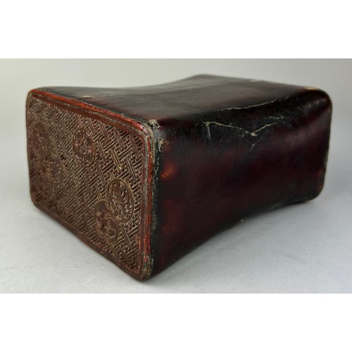 290 - A JAPANESE RED CINNABAR LACQUERED PILLOW, 

18cm x 13cm x 8cm